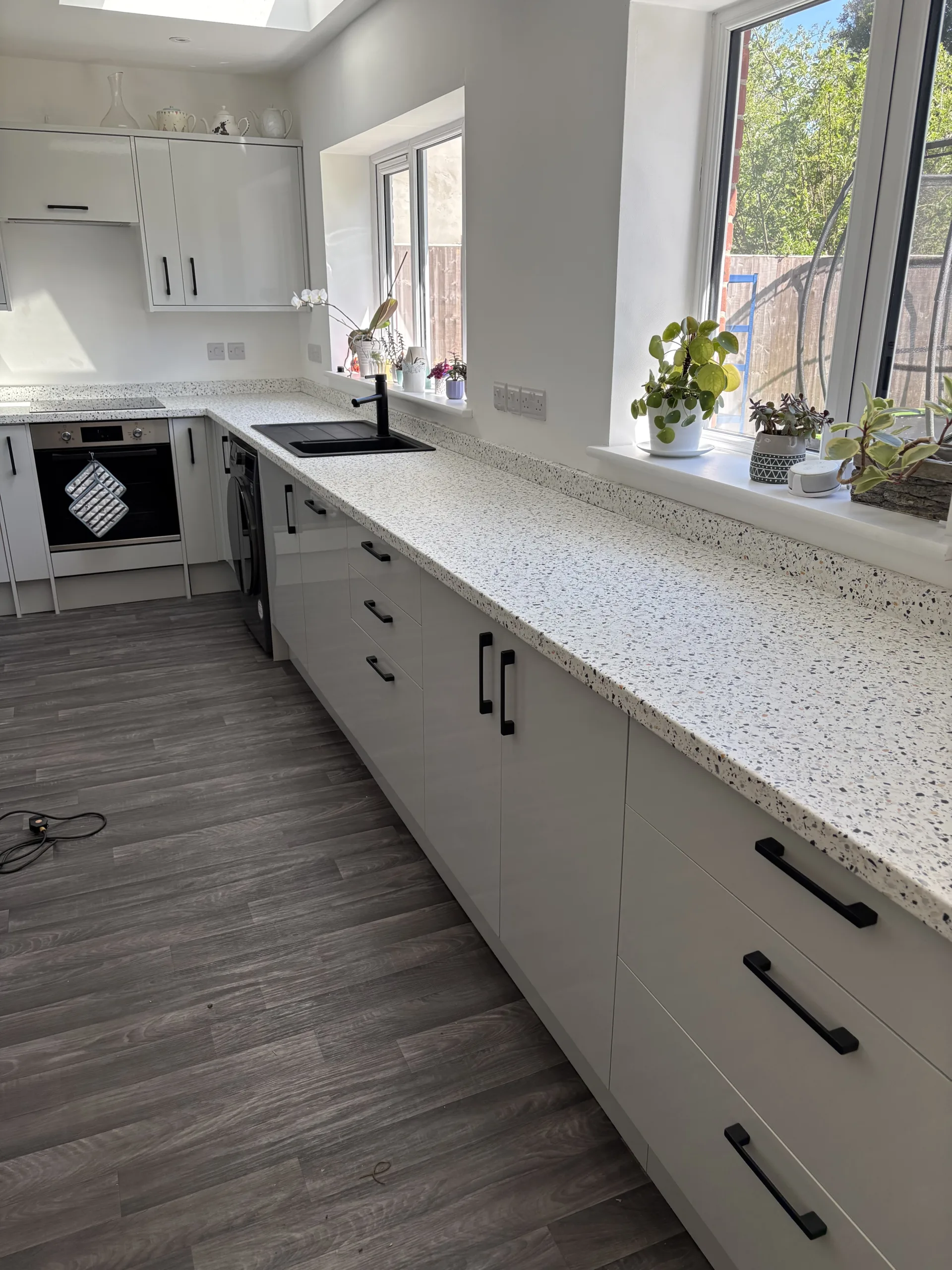 Finished light terrazzo-effect worktop wrapping in Bawburgh near Norwich