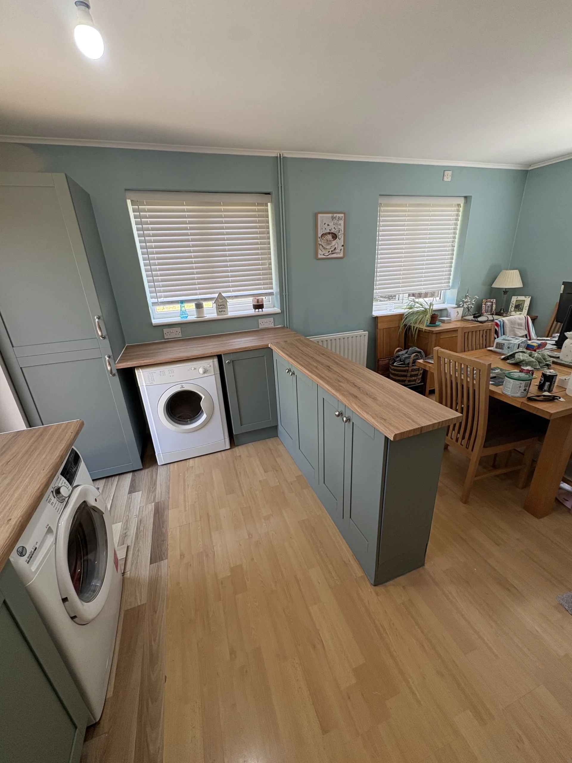 Warm oak-style wrapped kitchen worktops in Bowthorpe, Norwich